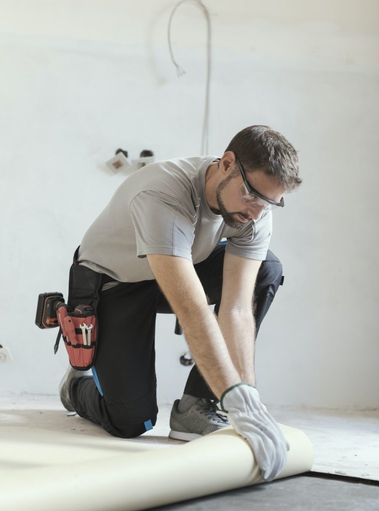 contractor-removing-an-old-linoleum-flooring.jpg contractor-removing-an-old-linoleum-flooring.jpg